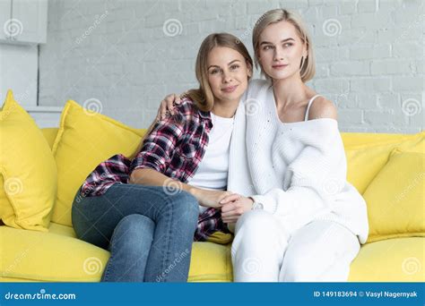 mature nl lesbian|Mature lesbian couple at home on sofa Stock Video